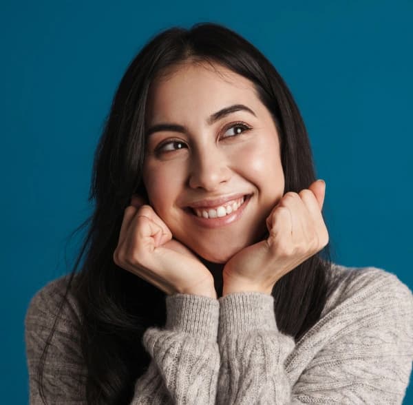 Smiling woman with bright white teeth after teeth whitening